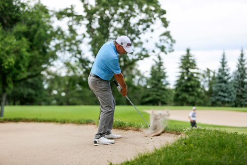 JUSTIN SAMANSKI-LANGILLE / WINNIPEG FREE PRESS
Rob McMillan chips the ball out of a sand trap during the Players Cup at Pine Ridge Golf and Country Club Thursday.
170706 - Thursday, July 06, 2017.