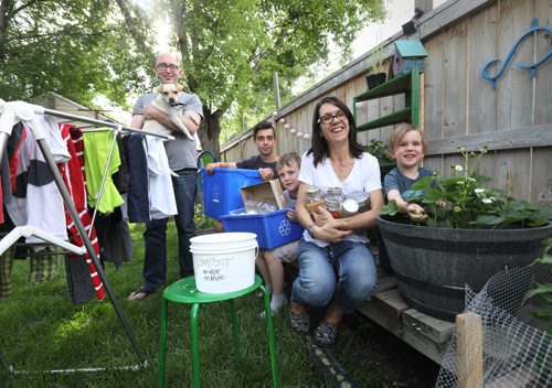 RUTH BONNEVILLE / WINNIPEG FREE PRESS

Green Page - Angela Anderson and her family are trying to reducing the amount of garbage they throw away as much as possible by recycling, reusing, repurposing and buying products with less packaging.  
Names: Angela Anderson (mom) with Atticus Anderson Johnson -3yrs, Sylar Anderson Johnson- 6yrs, Mason Pidlaski -14yrs and her fiancé, Christian Johnson.  
See Dave Baxter story.  


July 6, 2017