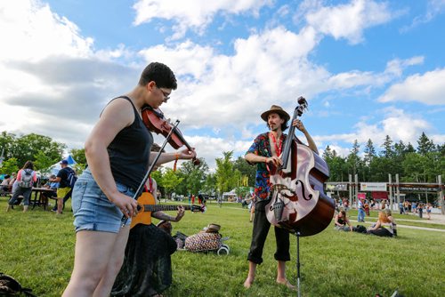 JUSTIN SAMANSKI-LANGILLE / WINNIPEG FREE PRESS
Shoshana Goldenberg (L) and Quintin Bart (R) of Javel perform at the Village Tower Thursday as part of the Folk Festival activities. 
170706 - Thursday, July 06, 2017.