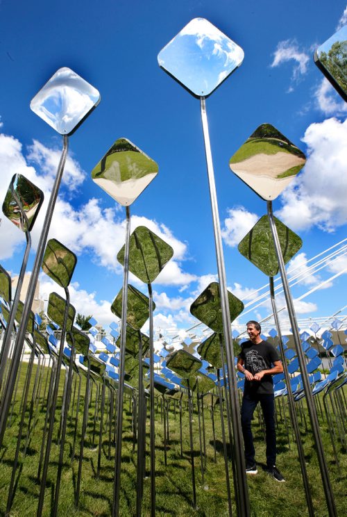 WAYNE GLOWACKI / WINNIPEG FREE PRESS

Marc Boutin with the Marc Boutin Architectural Collaborative based in Calgary, AB. checks out their invited submission titled Bend at Esplanade Riel (The Forks). This is one of the three new Cool Gardens 2017 and four returning gardens officially unveiled Friday morning. Through the clustering of mirrors, enjoy the reflection of both the sky and earth, which creates a third and alternative visual space. Cool Gardens presented by StorefrontMB, The Forks and La Maison des artistes is a public exhibition that celebrates contemporary garden culture, public art and the local landscape. This year, it will include six installation sites running from Main Street through the Forks to Provencher Boulevard in Winnipeg, as well as one at the Riverbank Discovery Centre in Brandon. release  July 7  2017