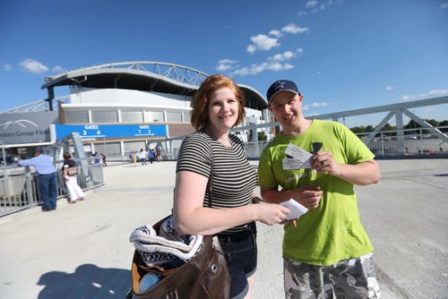 RUTH BONNEVILLE / WINNIPEG FREE PRESS

Winnipeg Blue Bomber fans, Twila & Nick Unrau, are all smiles after they take the bus shuttle for the first time and get dropped off at new terminal for the first game at Investors Group Field Friday evening. 

See Carol Sanders story.  


July 07, 2017