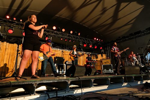 JUSTIN SAMANSKI-LANGILLE / WINNIPEG FREE PRESS
John K. Samson performs with The Winter Heat and an ASL interpreter on the Main Stage Friday at Folk Fest.
170707 - Friday, July 07, 2017.