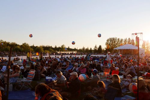 JUSTIN SAMANSKI-LANGILLE / WINNIPEG FREE PRESS
Crowds toss beach balls and take in the music Friday as the sun sets on the Main Stage at Folk Fest.
170707 - Friday, July 07, 2017.