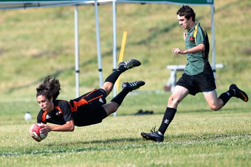 JOHN WOODS / WINNIPEG FREE PRESS
EastMan Storm's Ciaran Woods (11) scores a try against North Saskatchewan Rugby Union (NSRU) in a U-16 playoff game during the Man-Sask Rugby tournament in Brandon Sunday, July 9, 2017. EastMan, which includes Winnipeg, went on to defeat NSRU 34-7 and take home a third place in the tournament. Woods will represent the province in the upcoming National Rugby Tournament in Calgary.