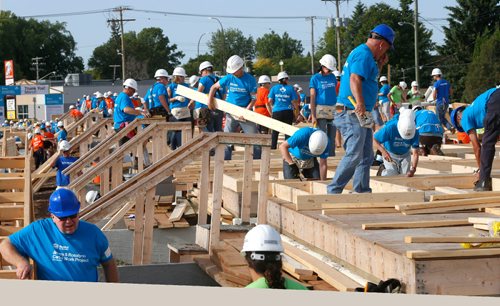 WAYNE GLOWACKI / WINNIPEG FREE PRESS

About 500 volunteers started building  20 homes on Lyle St. Monday morning as part of the Habitat for Humanitys 34th Jimmy & Rosalynn Carter Work Project¤ that runs July 9-14 in cities across Canada. Together they will be building 150 homes in celebration of Canadas 150th anniversary.Kevin Rollason story  July 10  2017