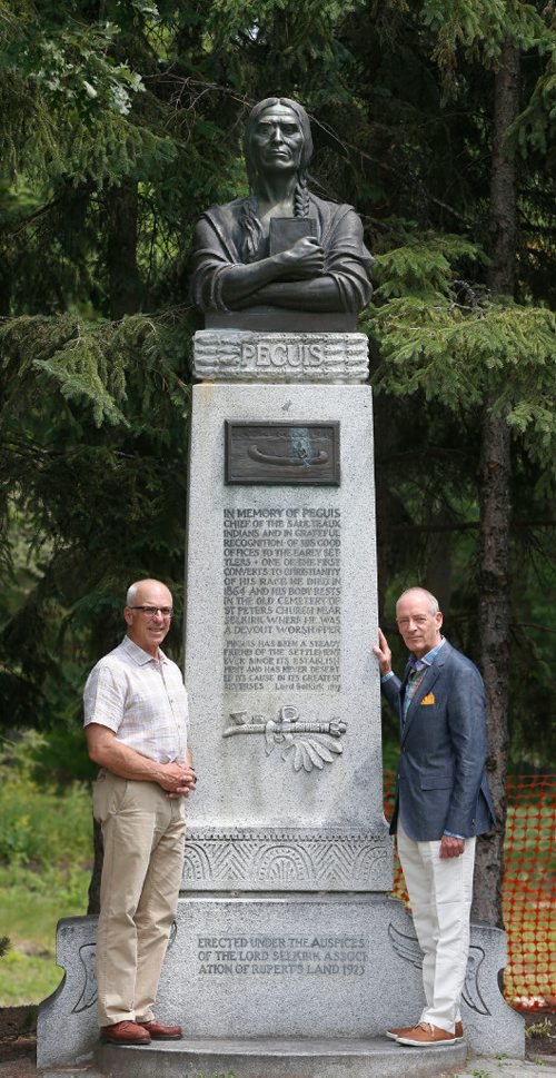 WAYNE GLOWACKI / WINNIPEG FREE PRESS

49.8 - Selkirk treaty.  Scots Gordon Cameron and John Perrin,right, with the  Chief Peguis statute at Kildonan Park. Cameron is a direct descendant of Selkirk Settler, Donald Gunn. Perrin is a former president of the St. Andrews Society and head of the Scottish Heritage Council, a Mb cultural group. Both are organizers of a week-long series of events to mark the 200th anniversary of the Selkirk Treaty, a document unique in western Canadian history. Alex Paul story  July 10  2017