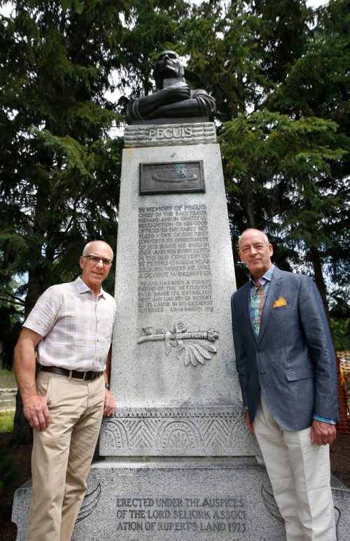 WAYNE GLOWACKI / WINNIPEG FREE PRESS

49.8 - Selkirk treaty.  Scots Gordon Cameron and John Perrin,right, with the Chief Peguis statute at Kildonan Park. Cameron is a direct descendant of Selkirk Settler, Donald Gunn. Perrin is a former president of the St. Andrews Society and head of the Scottish Heritage Council, a Mb cultural group. Both are organizers of a week-long series of events to mark the 200th anniversary of the Selkirk Treaty, a document unique in western Canadian history. Alex Paul story  July 10  2017