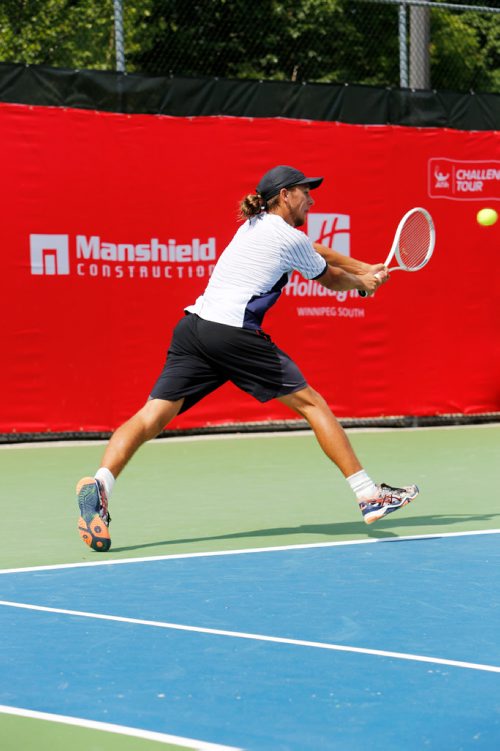 JUSTIN SAMANSKI-LANGILLE / WINNIPEG FREE PRESS
American Connor Farren lunges for the ball during a rally at the National Bank Challenger Monday.
170710 - Monday, July 10, 2017.