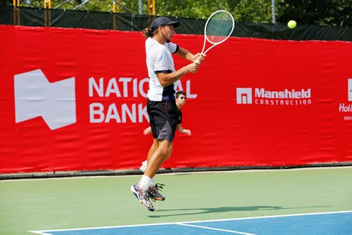 JUSTIN SAMANSKI-LANGILLE / WINNIPEG FREE PRESS
American Connor Farren returns the ball during a rally at the National Bank Challenger Monday.
170710 - Monday, July 10, 2017.