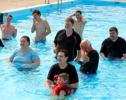 BORIS MINKEVICH / WINNIPEG FREE PRESS
Doug Speirs at Provencher Pool participates in the making of a video to promote drowning prevention week for the Lifesaving Society.  He is in the centre in black shirt. July 10, 2017