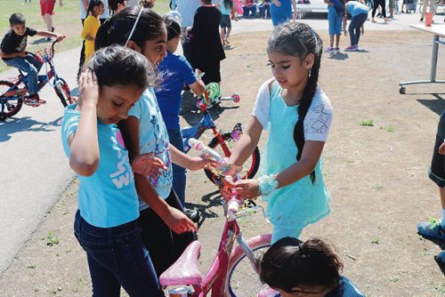 Canstar Community News June 26, 2017 - Students decorated their bikes for the Pride parade at Amber Trails Community School Pride picnic. (LIGIA BRAIDOTTI/CANSTAR COMMUNITY NEWS/TIMES)