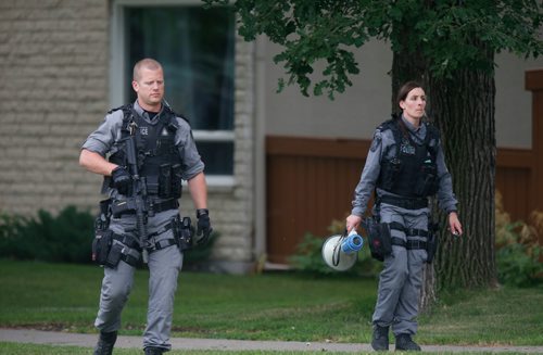 WAYNE GLOWACKI / WINNIPEG FREE PRESS

Members of the Winnipeg Police Tactical Support Team were in a unit in the River East Gardens at 1445 Rothesay St. Tuesday afternoon.  Rothesay St. at Donwood Drive was closed to traffic during the event. July 11  2017
