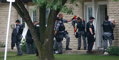 WAYNE GLOWACKI / WINNIPEG FREE PRESS
The Winnipeg Police Tactical Support Team were in a unit in the River East Gardens at 1445 Rothesay St. Tuesday afternoon. Rothesay St. at Donwood Drive was closed to traffic during the event. July 11 2017