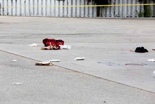 JUSTIN SAMANSKI-LANGILLE / WINNIPEG FREE PRESS
Debris, including blood soaked paper towels and a black shirt are seen next to a red SUV in a gas station parking lot at the corner of Maryland and Portage Tuesday evening.
170711 - Tuesday, July 11, 2017.