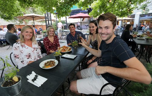 JASON HALSTEAD / WINNIPEG FREE PRESS

L-R: Katie Cook (SwimAbility volunteer), Callie Chalmers (SwimAbility volunteer) and attendees Donovan Gregoire, Carmen Arnold and Andrew Chudley enjoy themselves at Manitoba SwimAbilitys fundraising patio party July 10, 2017 at Stellas at the Centre culturel franco-manitobain. (See Social Page)