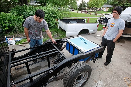 BORIS MINKEVICH / WINNIPEG FREE PRESS  080910 The Sasaki brothers are building an electric truck. (L-R) Nicholas and Dave in photo.