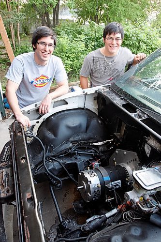 BORIS MINKEVICH / WINNIPEG FREE PRESS  080910 The Sasaki brothers are building an electric truck. (L-R) Dave and Nicholas  in photo.