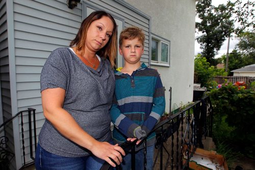 BORIS MINKEVICH / WINNIPEG FREE PRESS
Crystal Davis and her 9 year old son Michael pose for a photo. The boy was involved with a truck full of bike bandits in St. James. July 12, 2017