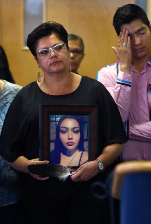 WAYNE GLOWACKI / WINNIPEG FREE PRESS

Delores Daniels holds a photograph of her murdered daughter Serena McKay beside her son Jonathan at the news conference held by the Missing and Murdered Indigenous Women and Girls Coalition along with  families and survivors in Winnipeg Wednesday.  Alex Paul story ¤July 12  2017