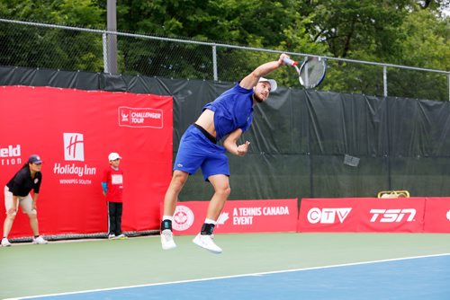 JUSTIN SAMANSKI-LANGILLE / WINNIPEG FREE PRESS
Canadian player Filip Peliwo jumps in the air during a serve at the the Challenger Tour Wednesday held at the Winnipeg Lawn and Tennis Club.
170712 - Wednesday, July 12, 2017.