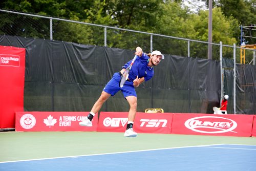 JUSTIN SAMANSKI-LANGILLE / WINNIPEG FREE PRESS
Canadian player Filip Peliwo jumps in the air during a serve at the the Challenger Tour Wednesday held at the Winnipeg Lawn and Tennis Club.
170712 - Wednesday, July 12, 2017.