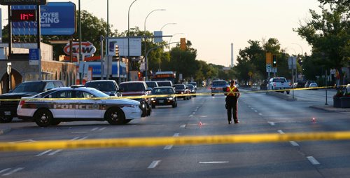 WAYNE GLOWACKI / WINNIPEG FREE PRESS

Winnipeg Police closed the southbound lanes on Main St. at Polson Ave. to traffic Friday morning.  A woman was found unconscious in the roadway on Main Street early Friday morning is in critical condition in hospital. July 14  2017