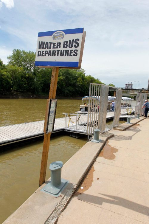 BORIS MINKEVICH / WINNIPEG FREE PRESS
Gord Cartwright, owner-operator, Splash Dash Boat Tours, has actually been able to run his water bus this year for the first time in three years, and says traffic is high. Here is a water bus stop at The Forks. KELLY TAYLOR STORY.  July 14, 2017