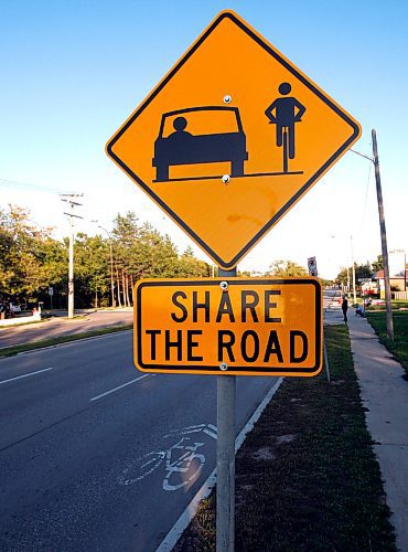 BORIS MINKEVICH / WINNIPEG FREE PRESS  080911 Share the Road sign painted on the Roblin Blvd. There were also signs.