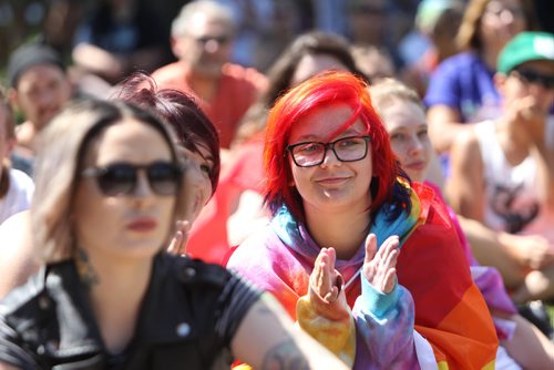 RUTH BONNEVILLE / WINNIPEG FREE PRESS

Julie Gaetz, who spent 8 hours dying her hair the colours of the rainbow, applauds and celebrates with hundreds of others during speeches being made at the 2nd annual Steinbach Pride Parade at K.R. Barkman Park iSaturday.


July 15, 2017