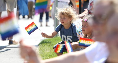 \RUTH BONNEVILLE / WINNIPEG FREE PRESS


Supporters of all ages  hold rainbow flags waving them to people walking in the Steinbach parade during the 2nd annual Steinbach Pride Parade in Steinbach Saturday.


July 15, 2017