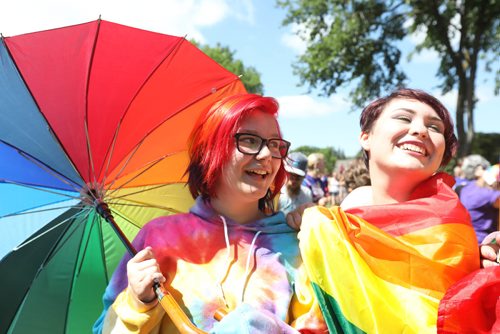 \RUTH BONNEVILLE / WINNIPEG FREE PRESS

Julie Gaetz (left) and her friend Emily Delipper get ready to participate in the start of the 2nd annual Steinbach Pride Parade at K.R. Barkman park  Saturday.


July 15, 2017