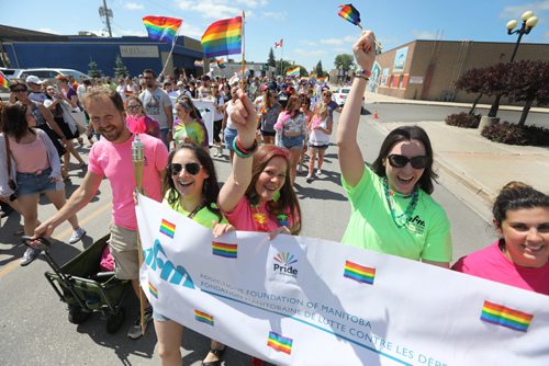 \RUTH BONNEVILLE / WINNIPEG FREE PRESS

Members of the AFM (Addictions Foundation Manitoba) celebrate with hundreds  of parade goers as they walk in the 2nd annual Steinbach Pride Parade Saturday.


July 15, 2017