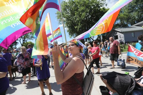 \RUTH BONNEVILLE / WINNIPEG FREE PRESS

Members of the Manitoba Teachers Society hold  rainbow flags while they walk in the 2nd annual Steinbach Pride Parade Saturday.


July 15, 2017