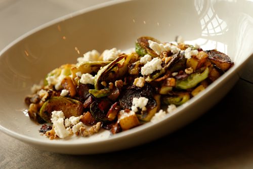 JOHN WOODS / WINNIPEG FREE PRESS
The Roasted Brussel Sprouts with apples, toasted walnuts, queso fresco, bacon and fresh nutmeg at One Great City Brewing Company Sunday, July 16, 2017.