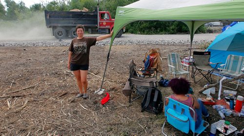 BORIS MINKEVICH / WINNIPEG FREE PRESS
Parker Lands development protestors are camped out on the development site to try to stop it. Protestor Jenna Vandal, standing, is one of the head people on site. BEN WALDMAN STORY  July 17, 2017
