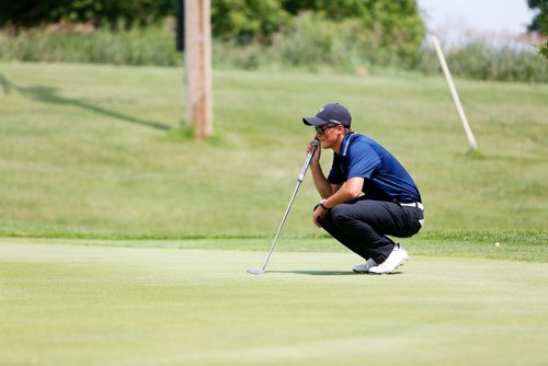 JUSTIN SAMANSKI-LANGILLE / WINNIPEG FREE PRESS
Mitch Rowland lines up his next putt during the first round of the Manitoba Men's Amateur Championships Monday at Selkirk Golf and Country Club.
170717 - Monday, July 17, 2017.