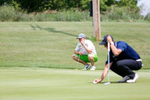 JUSTIN SAMANSKI-LANGILLE / WINNIPEG FREE PRESS
Aaron McIntyre (Background) thinks through his next putt during the first round of the Manitoba Men's Amateur Championships Monday at Selkirk Golf and Country Club.
170717 - Monday, July 17, 2017.