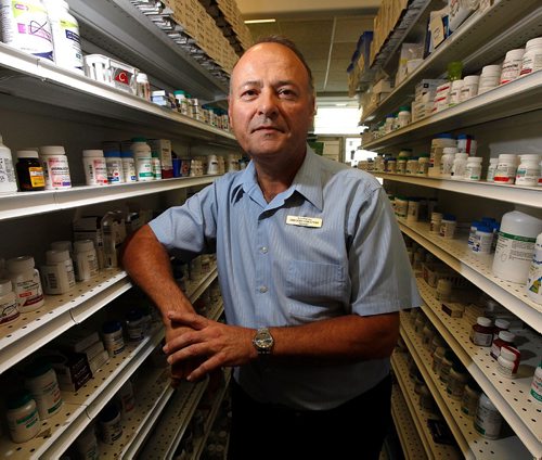 PHIL HOSSACK / WINNIPEG FREE PRESS  -  Greg Harochaw poses in his dispensary Tuesday afternoon. See Larry Kusch story re: dispensing fees and provincial government healthcare cutbacks. - July 18, 2017