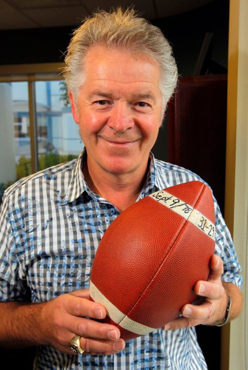 BORIS MINKEVICH / WINNIPEG FREE PRESS
Former Blue Bomber Joe Poplawski posing with an inscribed game ball given to him for his part in a miracle comeback against Ottawa on Sept. 9, 1978.   July 19, 2017