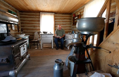 WAYNE GLOWACKI / WINNIPEG FREE PRESS 

Philip Thorkelson, director of the  Arborg & District Multicultural Heritage Village in Arborg, Manitoba sits in the kitchen of the Vigfusson House in the village.   Kevin Rollason story. July 18   2017