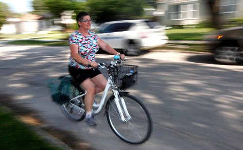 PHIL HOSSACK / WINNIPEG FREE PRESS  -  Mature Women's Centre participant Joan Boone counts the wrongs in the Pallister Government decision to close the support program run out of the Victoria Hopital. She credits the centre for her quality of life today, including the ability to ride her bicycle and swim every day. See Nick Martin story. -  July 19, 2017