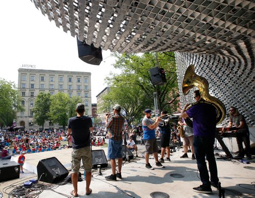 WAYNE GLOWACKI / WINNIPEG FREE PRESS

The Dirty Catfish Brass Band perform in the cube for Lunchtime Winnipeg Fringe Festival entertainment at Market Square in Winnipeg's Exchange District on Thursday.¤The Fringe Festival continues until July 30.       July 20   2017
