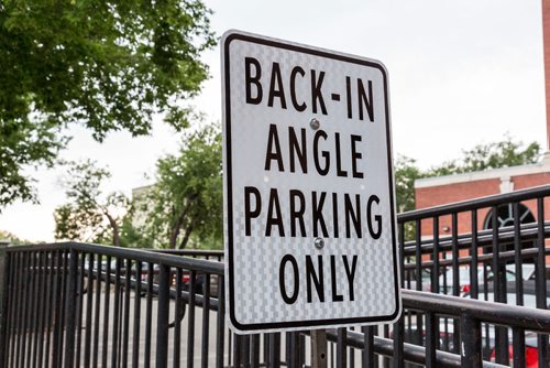 JUSTIN SAMANSKI-LANGILLE / WINNIPEG FREE PRESS
A sign explains the new parking procedure for the new angled parking spots on Bannatyne Ave. The change from parallel to angled street parking will increase the total parking spots in the area by 10.
170721 - Friday, July 21, 2017.