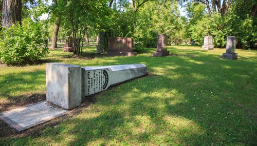 MIKE DEAL / WINNIPEG FREE PRESS
The memorial for Winnipeg's first mayor Francis Evans Cornish lies on the ground in Brookside Cemetery since being vandalized this past May. He was elected Mayor in 1874 and passed away in 1878.
170724 - Monday, July 24, 2017.