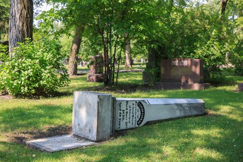 MIKE DEAL / WINNIPEG FREE PRESS
The memorial for Winnipeg's first mayor Francis Evans Cornish lies on the ground in Brookside Cemetery since being vandalized this past May. He was elected Mayor in 1874 and passed away in 1878.
170724 - Monday, July 24, 2017.