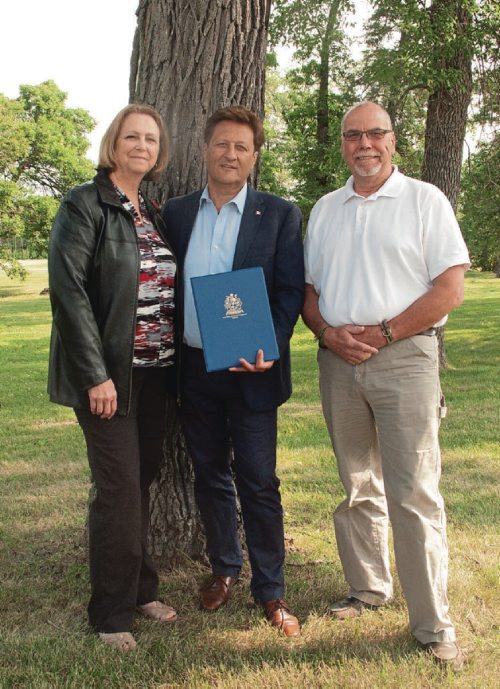 Canstar Community News July 20, 2017 - (From left) East St. Paul mayor Shelley Hart, St. Paul MLA Ron Schuler, and West St. Paul mayor Bruce Henley at Hyland Provincial Park for a Dutch Elm Disease Management Funding announcement. (SHELDON BIRNIE/CANSTAR/THE HERALD)