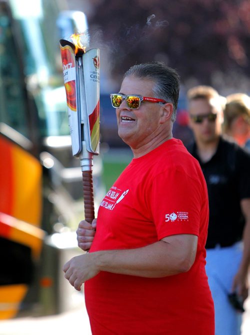 BORIS MINKEVICH / WINNIPEG FREE PRESS
2017 Canada Games torch relay photos. Torchbearer 'Dancing Gabe' Langlois at the starting point. July 26, 2017