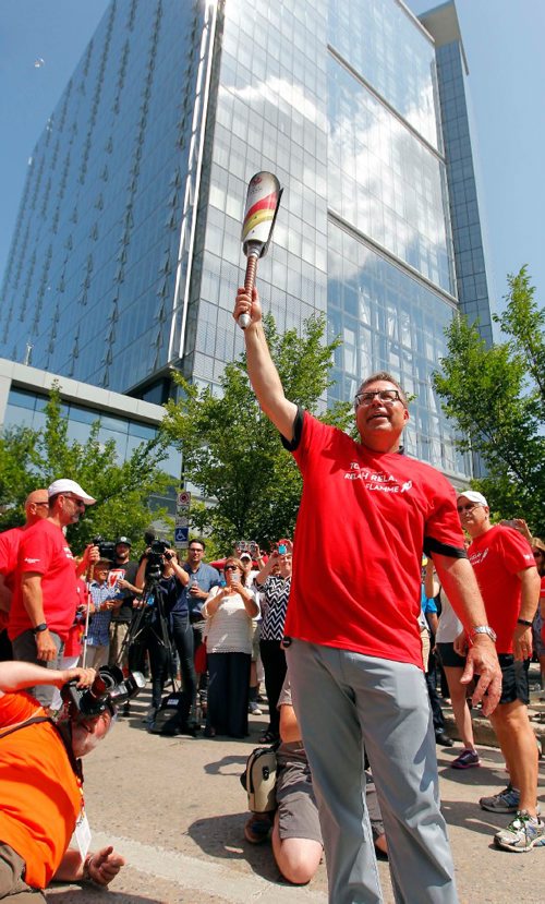 BORIS MINKEVICH / WINNIPEG FREE PRESS
2017 Canada Games torch relay photos. CEO of Manitoba Hydro Kelvin Shepherd is the last torchbearer that ended up at the celebration at the new Hydro building. July 26, 2017