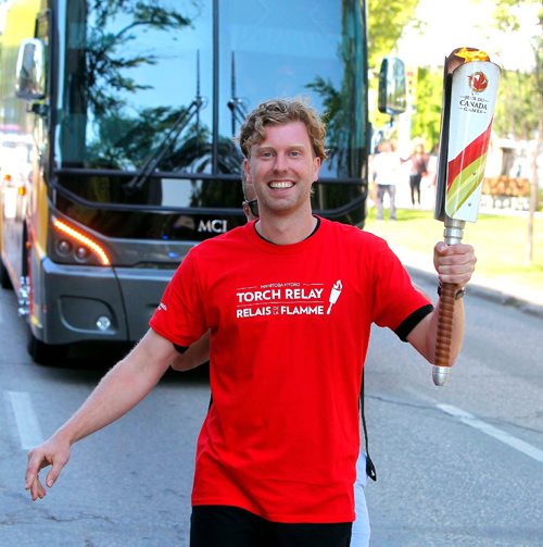 BORIS MINKEVICH / WINNIPEG FREE PRESS
2017 Canada Games torch relay photos. Leg #3 Cameron Mundle. July 26, 2017