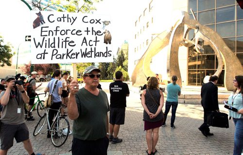 BORIS MINKEVICH / WINNIPEG FREE PRESS
Parkland protest at the Law Courts building today. General file shot. No ID on man holding sign. July 26, 2017